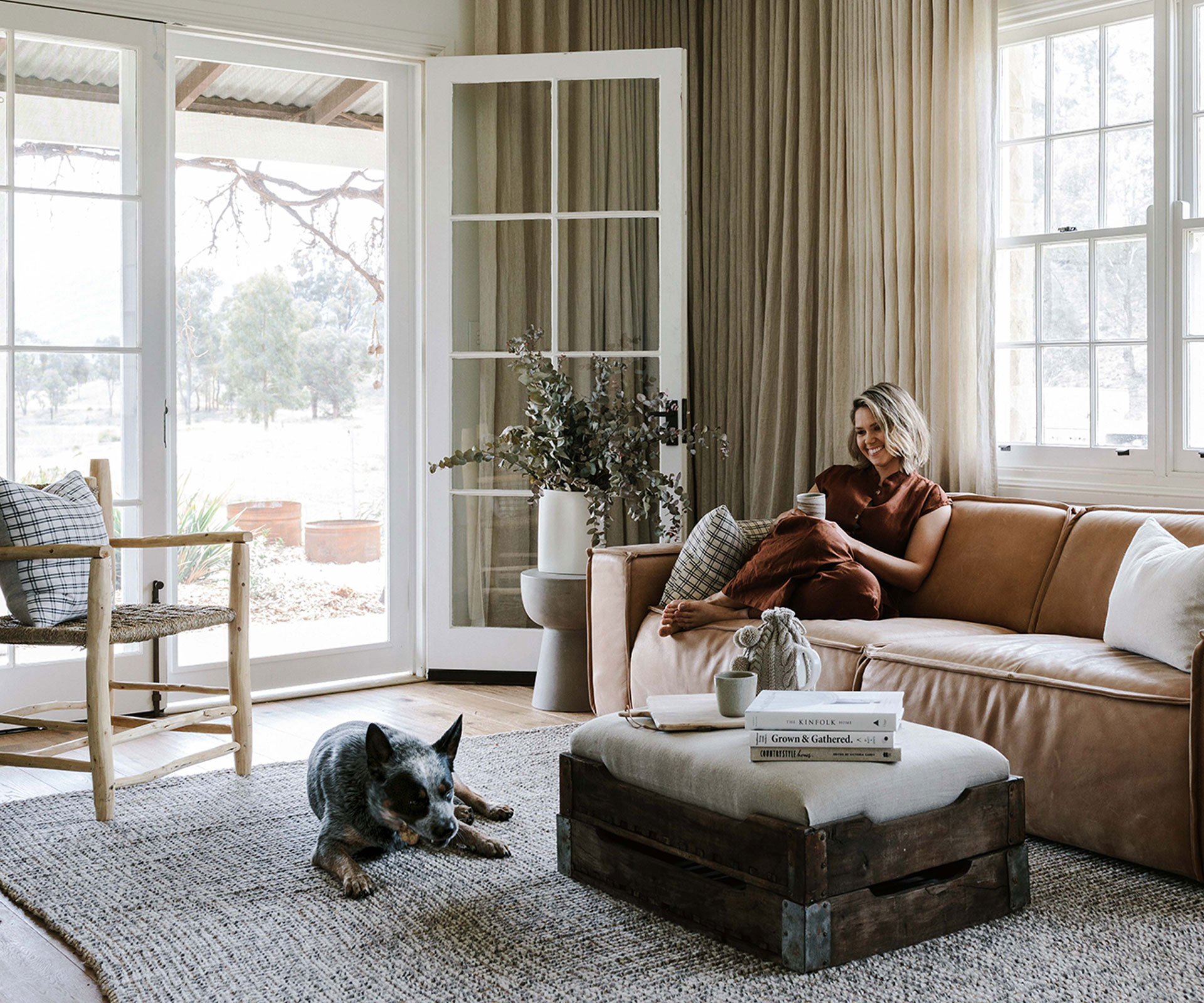 Edwina Bartholomew in the living room of her holiday home in the Blue Mountains