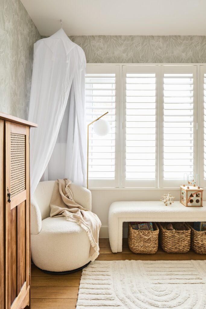 nursing chair in neutral toned nursery