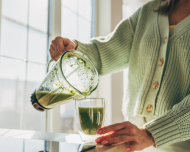 woman-pouring-green-juice